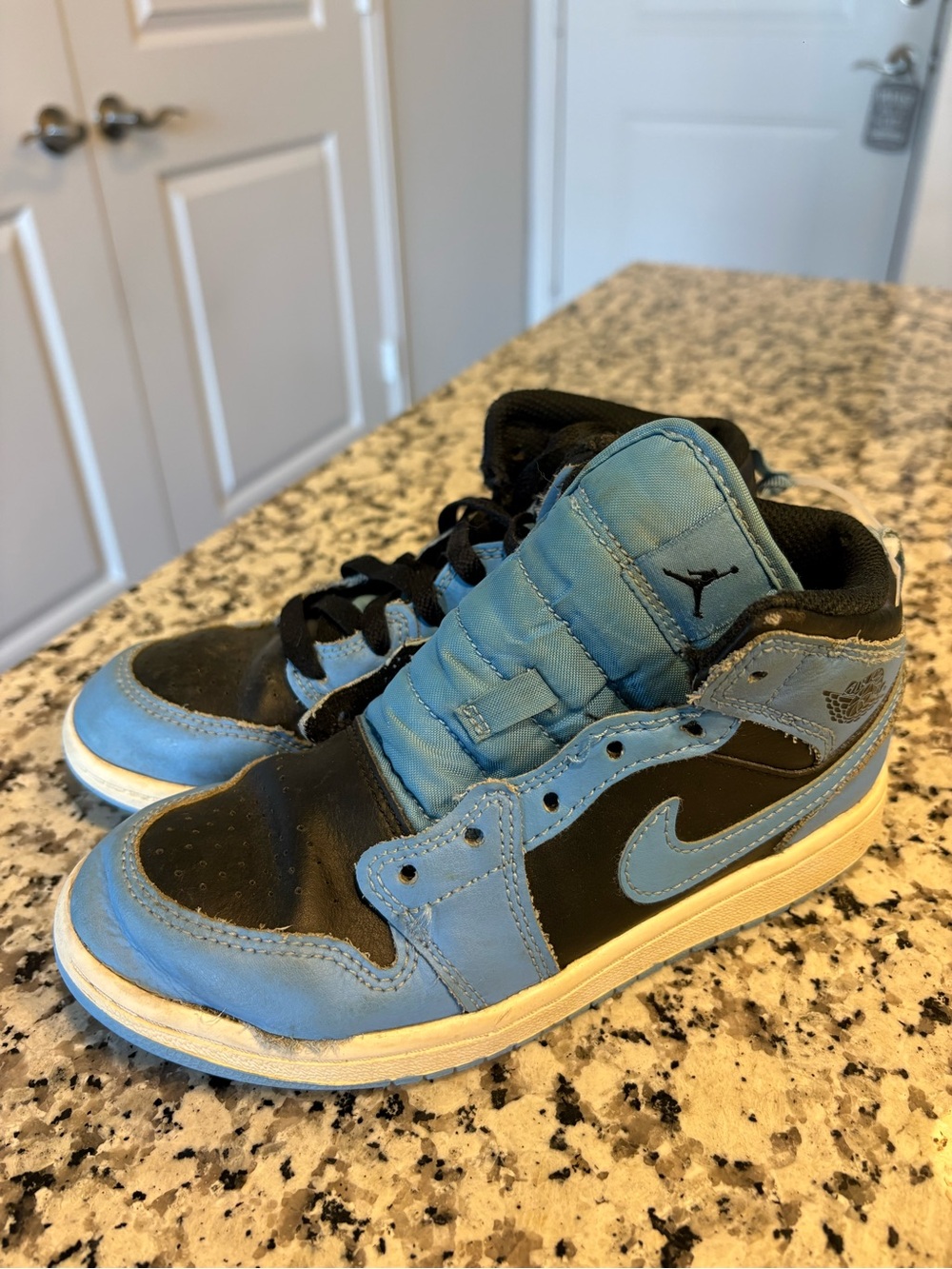 Nike Kids Light Blue and Black Jordan 1 Low Sneakers